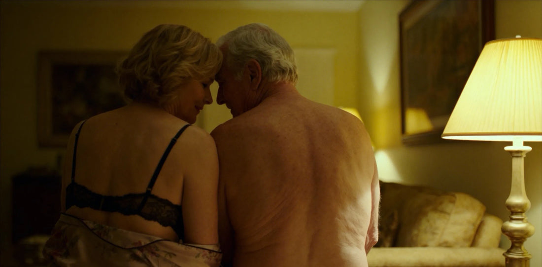 An elderly couple wearing sexy pajamas created a romantic atmosphere