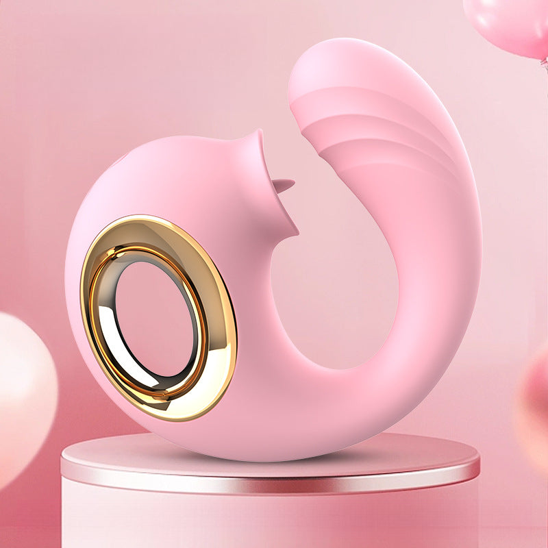 Pink G spot vibrator with gold accent and ergonomic curved design on a round pedestal