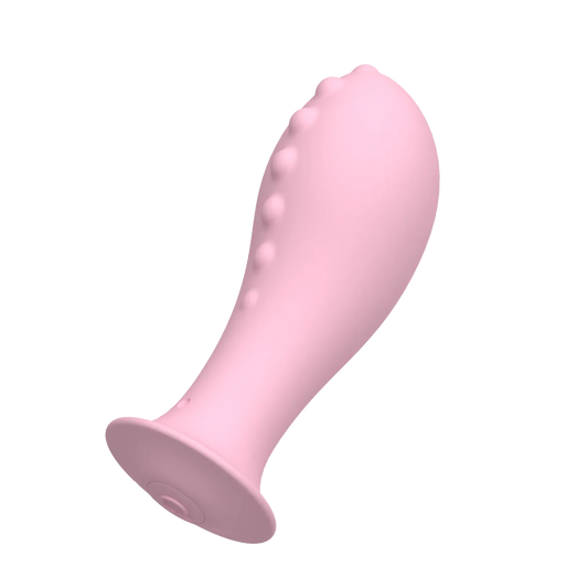 Side view of pink silicone anal trainer plug